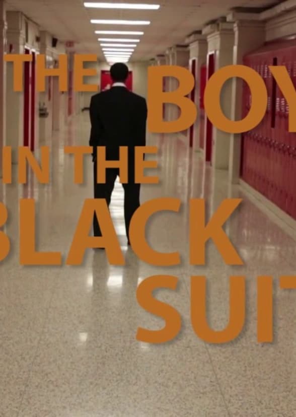 The boy in the black suit